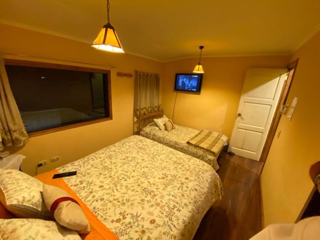 פוארטו מונט Hostal Y Cabanas Mirando Al Mar מראה חיצוני תמונה
